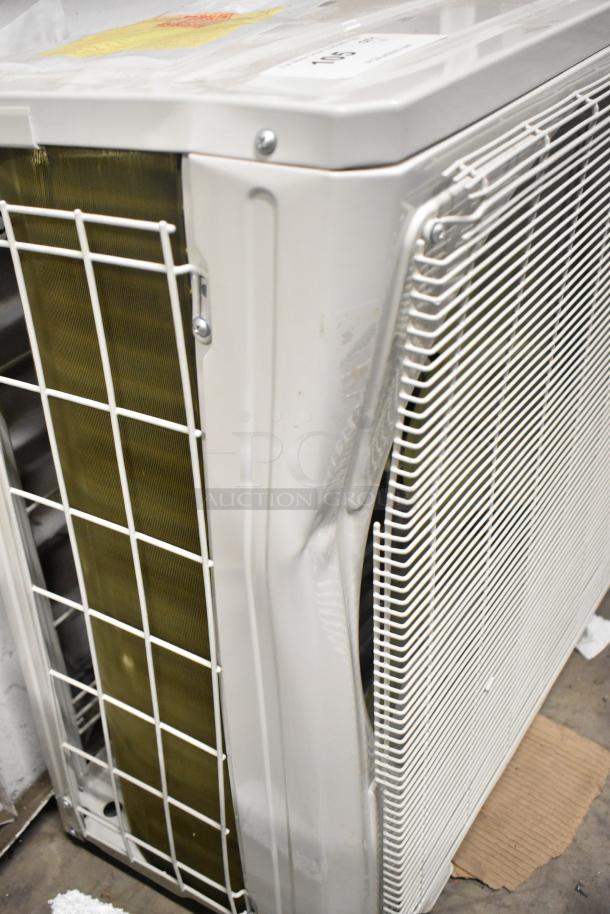 Pioneer YN018GLSI25RPH metal commercial air conditioner compressor, 208-230V, 1 phase; slightly dented exterior.