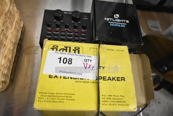 Heavy duty extension speaker Model ES-40, HitLights Eclipse Kit, audio controller. Auction tag reads “108 QTY Vx3”.