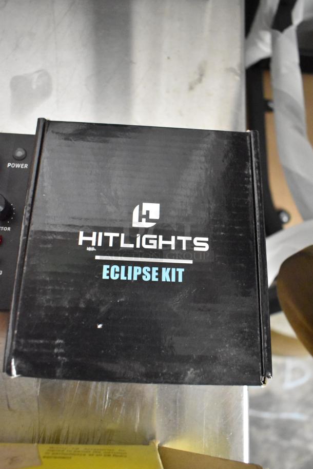 HitLights Eclipse Kit box, black with visible logo; part of a 3-item auction including a heavy-duty extension speaker.