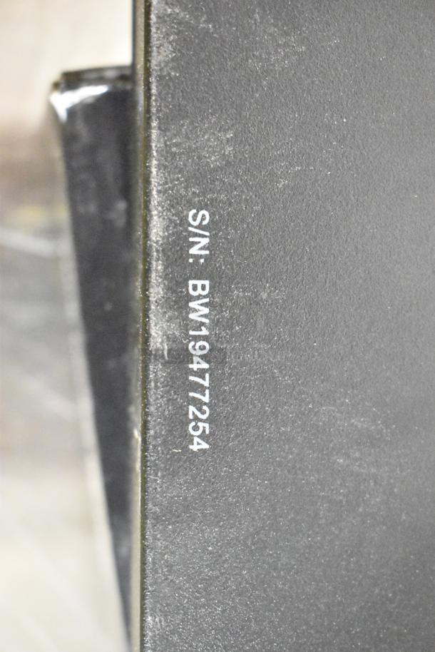 Heavy duty extension speaker with visible serial number BW19477254. Part of a set of three items.