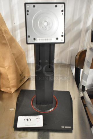 Tuf Gaming Stand in black, features adjustable height and swivel base, branded at the bottom, excellent condition, auction lot tag visible.