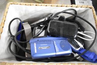Basket containing 22 mixed items, including phones and a blue Olympus S702 voice recorder. Items appear used.