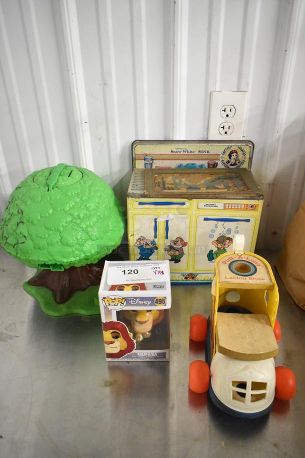 4 item lot: Fisher Price pull-along lacing shoe, Mufasa Funko Pop in box, tree toy, and Snow White play sink. Good condition.