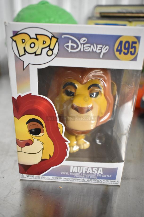 Mufasa Funko Pop in original box, Disney 495, vinyl figure, excellent condition, visible label and branding.