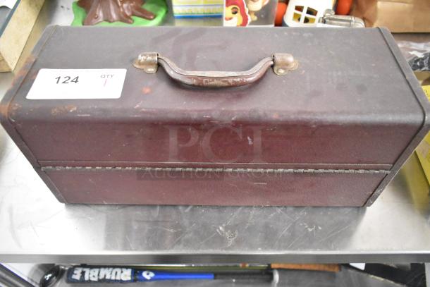 Vintage fishing tack box in worn condition with contents, includes handle and auction label marked "124 QTY 1."