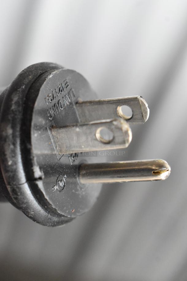 Close-up of a power plug for a 2022 Hemro KR1203 commercial coffee grinder, 120 volts, good condition.