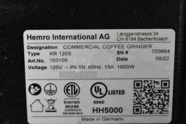 2022 Hemro KR1203 commercial coffee grinder, metal, 120V, 1 phase. Label shows model, serial number, and 1600W rating. Made in Germany.