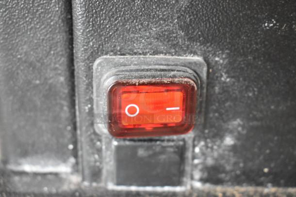 2022 Hemro KR1203 metal commercial coffee bean grinder power switch, 120V, 1 phase. Shows a red on/off button.