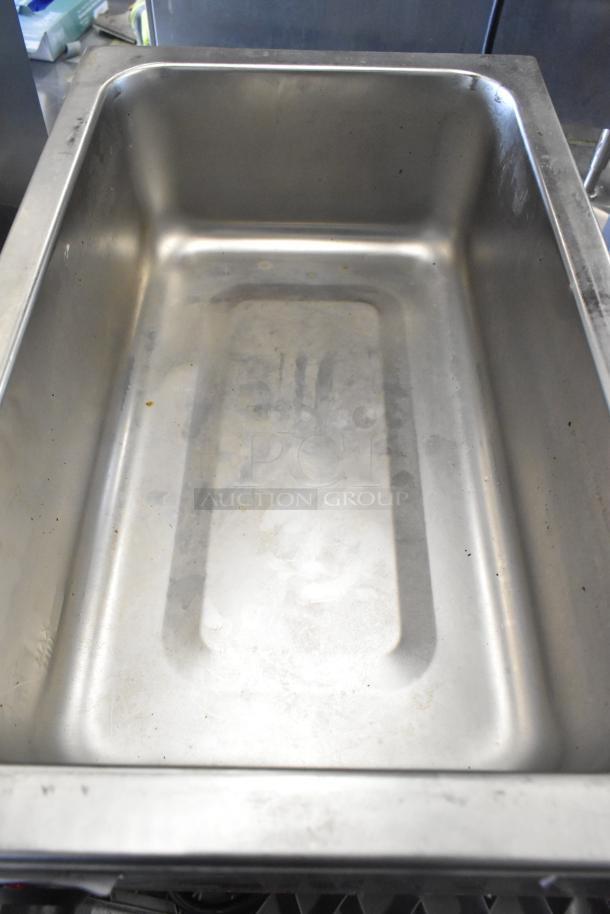 Avantco 177W50 Stainless Steel Commercial Food Warmer, 120V, 1 Phase, shows minor wear. Ideal for restaurant use.