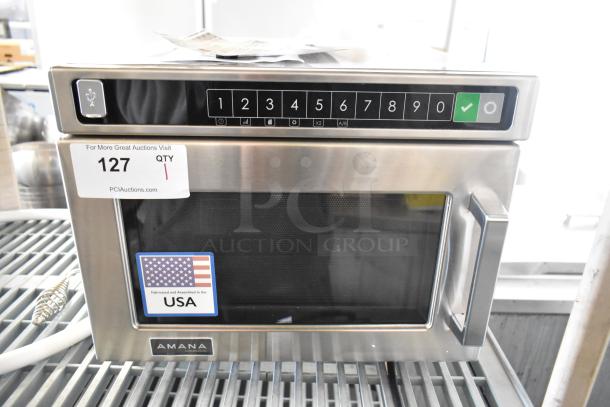 Brand new Amana HDC12A2 stainless steel commercial microwave with push button controls, 120V, 1 phase. Scratch and dent condition.