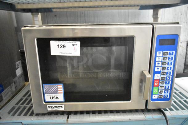 Brand new Solwave SWA21T countertop microwave oven, stainless steel, 208/240V, 1 phase. Features keypad, USA-made label.