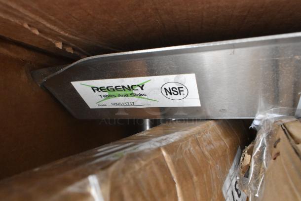 Regency work table label, model 600S11717. Item is NSF certified, part of a lot including various brand-new equipment.