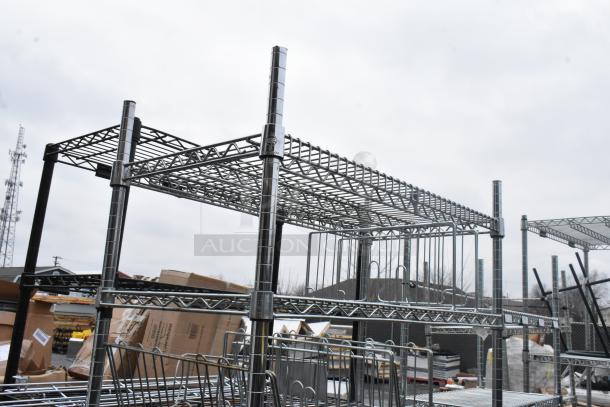 Chrome finish 6-tier wire shelving unit, outdoor setup. Condition appears intact. Buyer must dismantle, consider shipping.