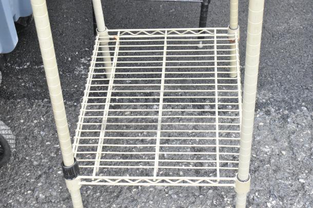 Chrome finish 2-tier wire shelving unit, sturdy metal construction. Buyer must dismantle for shipping.