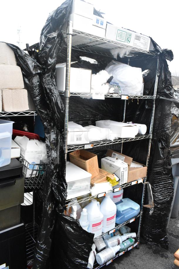 Chrome finish 6-tier wire shelving unit with contents, including hand soap and microfiber duster refills. Buyer must dismantle.