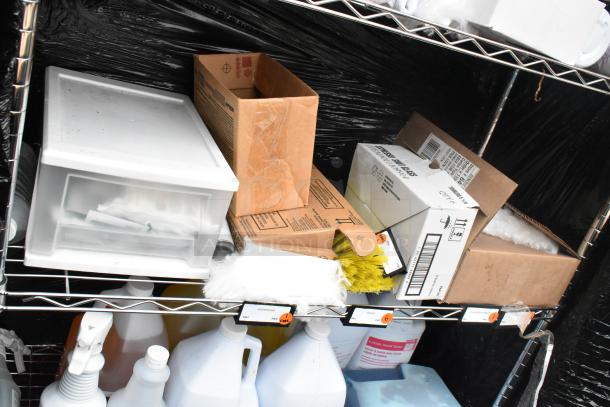 Chrome finish 6-tier wire shelving unit with lotion hand soap, microfiber duster refill, and storage boxes. Buyer must dismantle.