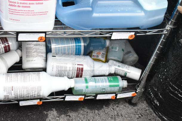 Chrome finish 6-tier wire shelving unit with hand soap bottles and cleaning products. Buyer must dismantle.