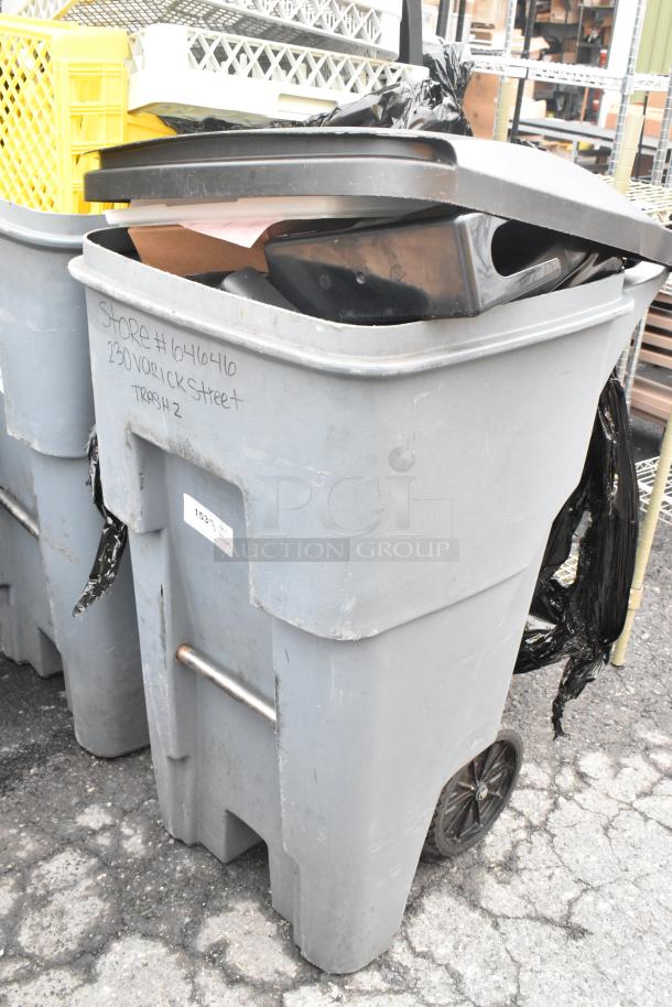 Rubbermaid gray poly trash can with contents, includes a poly bin. Marked "Store #646416, 230 Varick Street, Trash 2."