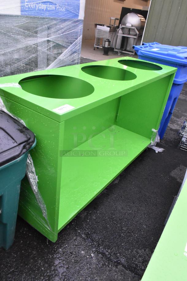 Green counter with three circular cutouts and an under shelf, in good condition, tagged with item number 11299.