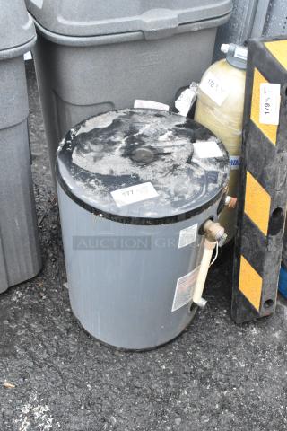 2016 Rheem Rudd EGSP15 Electric Water Heater, 120 Volts, 1 Phase; visible wear on top; labels intact; auction tag 177.