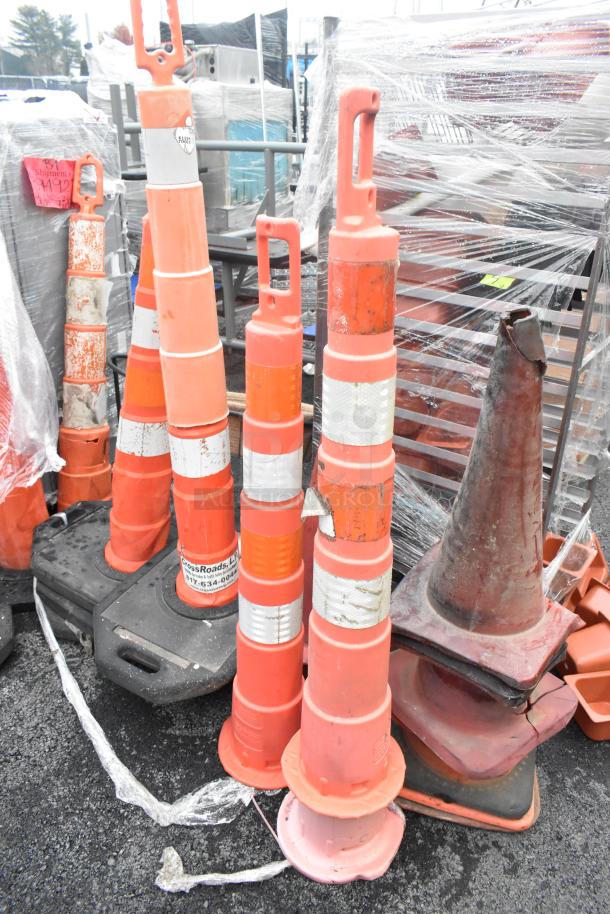 20 orange poly cones, various styles, some with reflective bands, used condition, bulk sale, 20 times your bid.