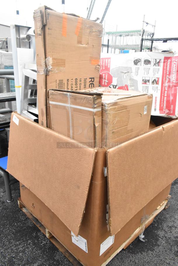 Large pallet with boxes containing 17 brand new scratch and dent items, including a tow behind spreader and work table.
