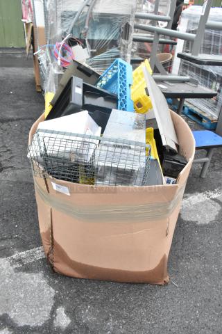 Lot of assorted bins, caddies in a cardboard container. Includes wire and plastic items, mixed condition. Label with lot number visible.