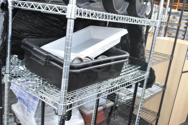 Chrome finish 3-tier wire shelving unit with 7 kegs, poly bins; contents included. Buyer must dismantle for shipping.