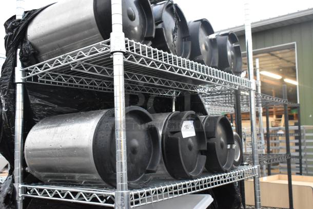 Chrome finish 3-tier wire shelving unit with 7 kegs and poly bins. Buyer must dismantle. Marked for freight charges.