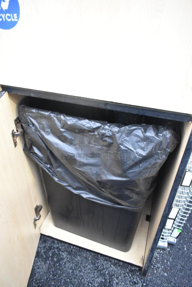 Wood pattern trash can shell with a trash can inside, featuring a trash deposit flap and door, in good condition.