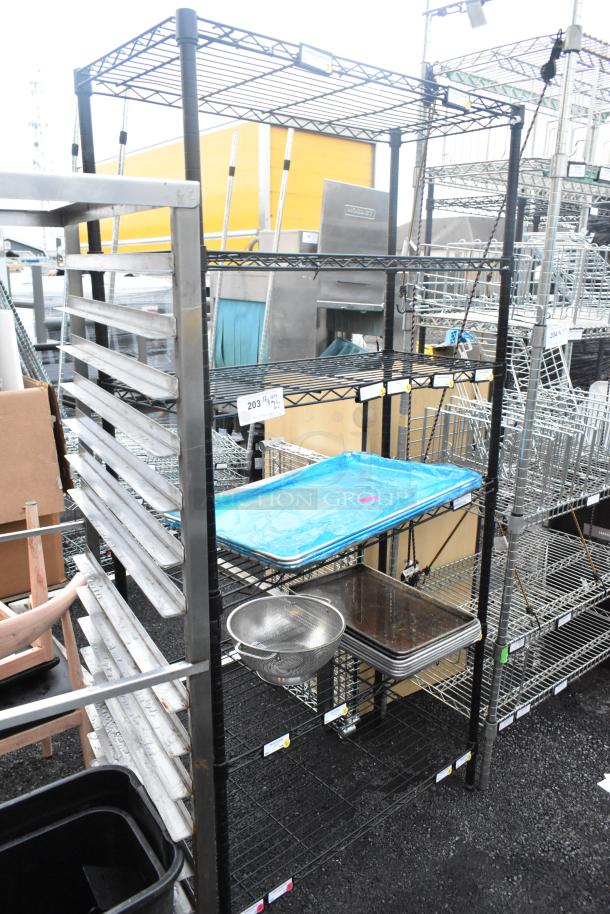 Black finish 6-tier wire shelving unit with various contents, buyer must dismantle. Consider freight charges.