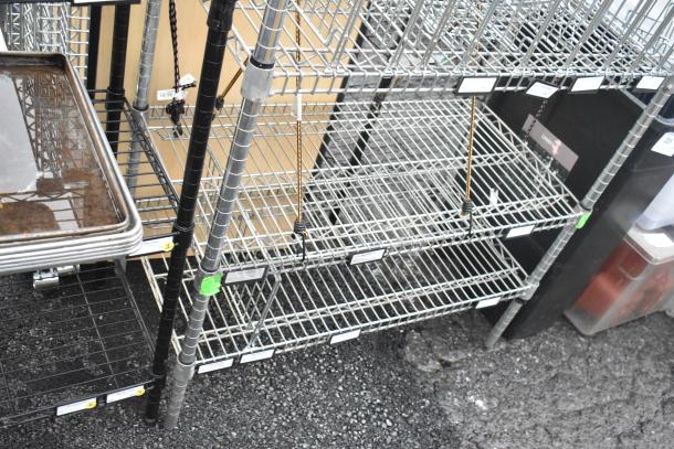 Chrome finish 6-tier wire shelving unit with contents. Buyer must dismantle. Visible labels and materials in good condition.