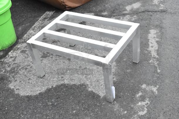 Metal Dunnage Rack, silver, four legs, three support bars, in good condition, suitable for storage or industrial use.