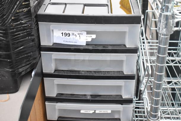 Clear and Black Poly 7 Drawer Unit with labeled drawers, in good condition. Auction label indicates PCI Auctions and lot number 199.
