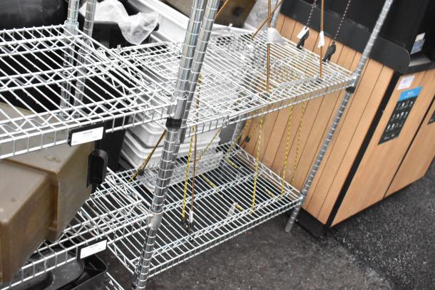 Chrome finish 6-tier wire shelving unit, condition appears used. Buyer to dismantle; consider freight charges.