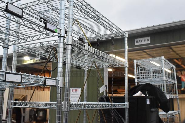 Chrome finish 6-tier wire shelving unit, tags visible. Buyer must dismantle. Consider freight charges.