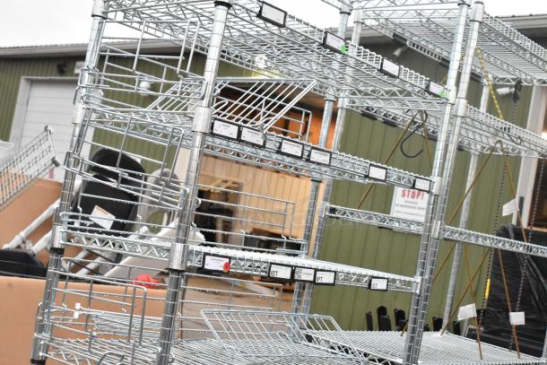 Chrome Finish 8 Tier Wire Shelving Unit in good condition. Features adjustable shelves, visible labels. Buyer must dismantle.