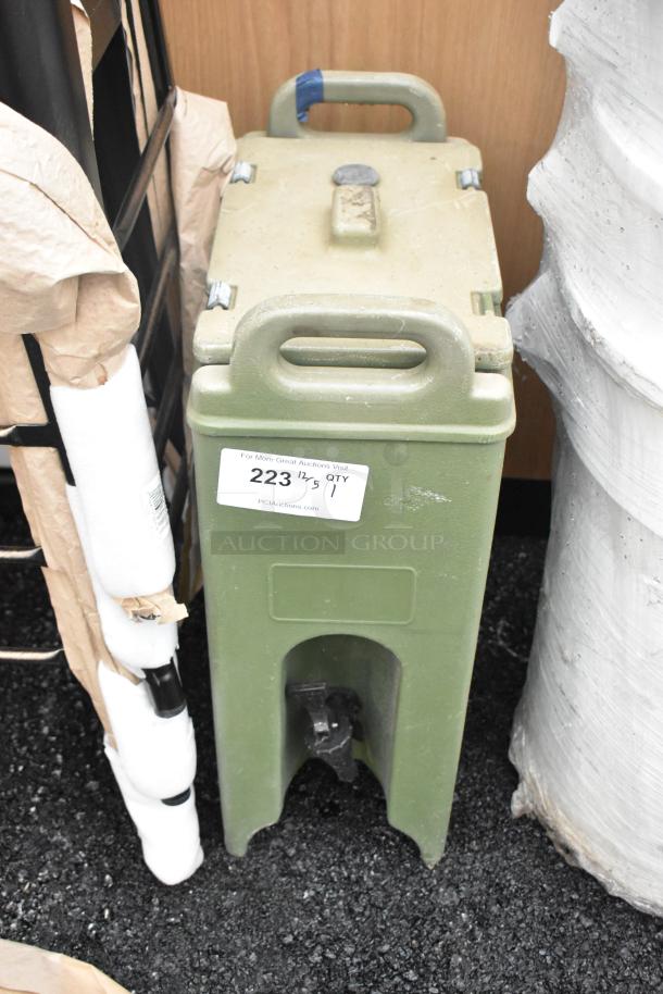 Green poly beverage holder dispenser with top handles and front spigot. Shows wear with auction tag label 223.