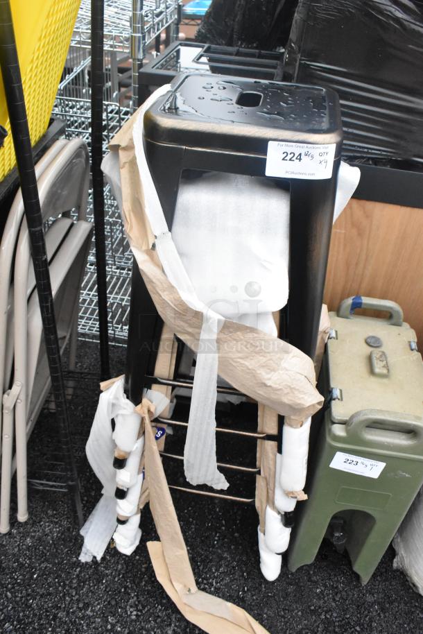 Brand new black metal Tolix style stool, scratch and dent condition, protective wrapping, 4 stools included.