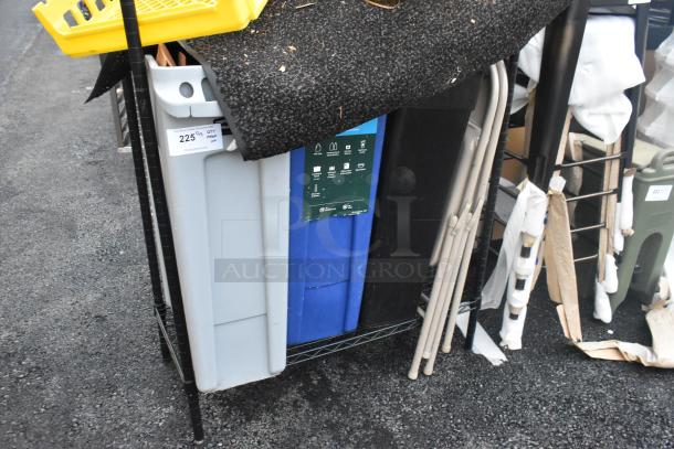 Black finish 2-tier wire shelving unit with contents, including Slim Jim trash cans. Note: Buyer must dismantle.