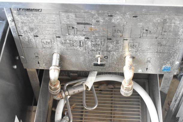 Pitco Frialator stainless steel commercial fryer oil filtration system on casters, visible wear, labeled controls.