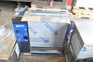 Prince Castle 297-T9 stainless steel vertical toaster, commercial countertop model. Features controls for temp adjust and toast thickness. 115 volts, 1 phase.