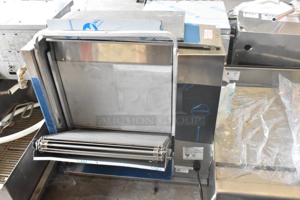 Prince Castle 297-T9 stainless steel commercial vertical toaster. Countertop model, 115 volts, 1 phase. Visible labels indicate power specs.