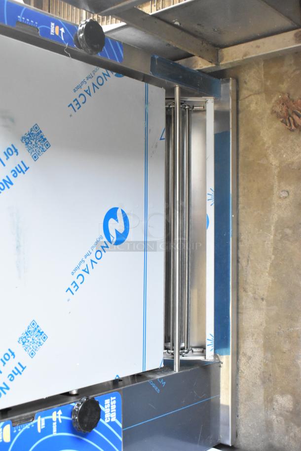 Prince Castle 297-T9 stainless steel vertical toaster, 115 volts, 1 phase. New condition with protective film intact.