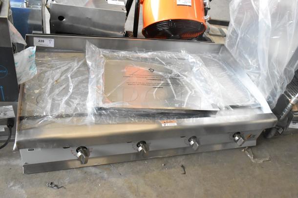 Brand new Cooking Performance Group 48" gas griddle, model 351GTCPG48NL, with flame failure protection. 120,000 BTU.