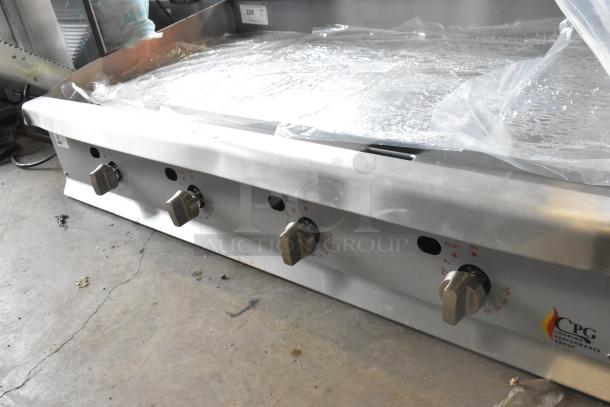 BRAND NEW Cooking Performance Group 48" gas griddle, model 351GTCPG48NL. Features thermostatic controls, flame failure protection, 120,000 BTU. Scratch and dent condition.