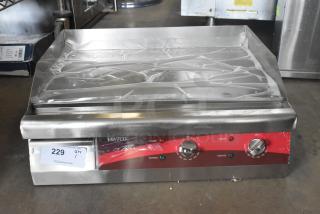 Brand new Avantco 177EG24N stainless steel commercial griddle with thermostatic controls, 208/240V, 1 phase. Scratch and dent condition.