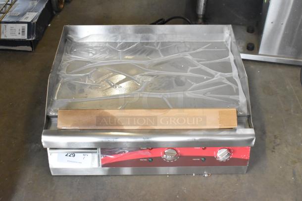 Brand new Avantco 177EG24N stainless steel countertop griddle with thermostatic controls, 208/240V, minor scratches.