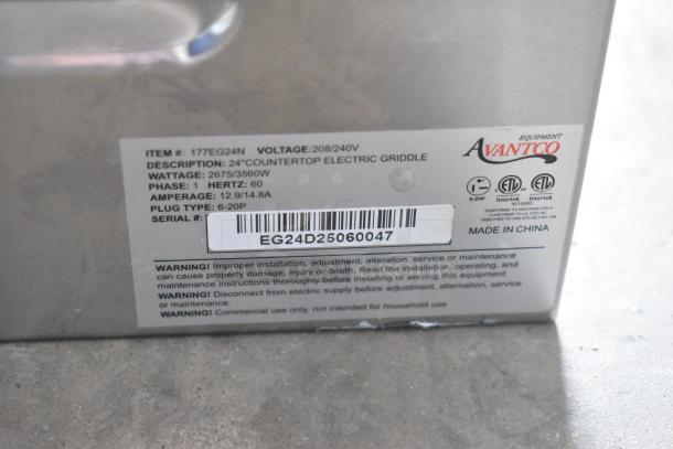 BRAND NEW Avantco 177EG24N stainless steel commercial griddle. Features thermostatic controls, 208/240V, 2675/3560W. Serial EG24D25060047.