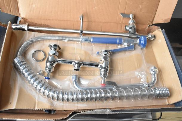 Brand new Waterloo 750PRD812 deck-mounted pre-rinse faucet, 1.15 GPM, 8" centers, 12" add-on faucet, scratch and dent condition.